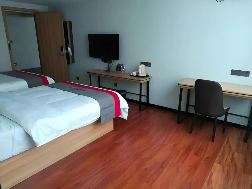 Bed in Jun Hotel Guangdong Zhanjiang Xiashan South Railway Station