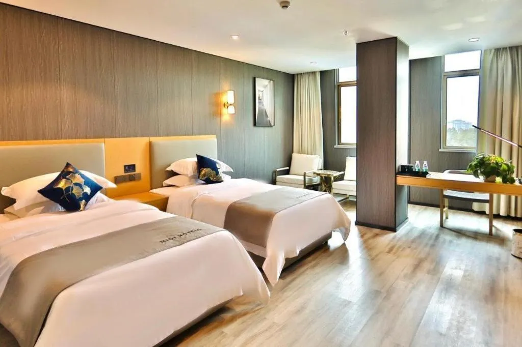 Bed in MIDI Hotel Guangdong Chaozhou Xiangqiao District Hanshan Teachers College