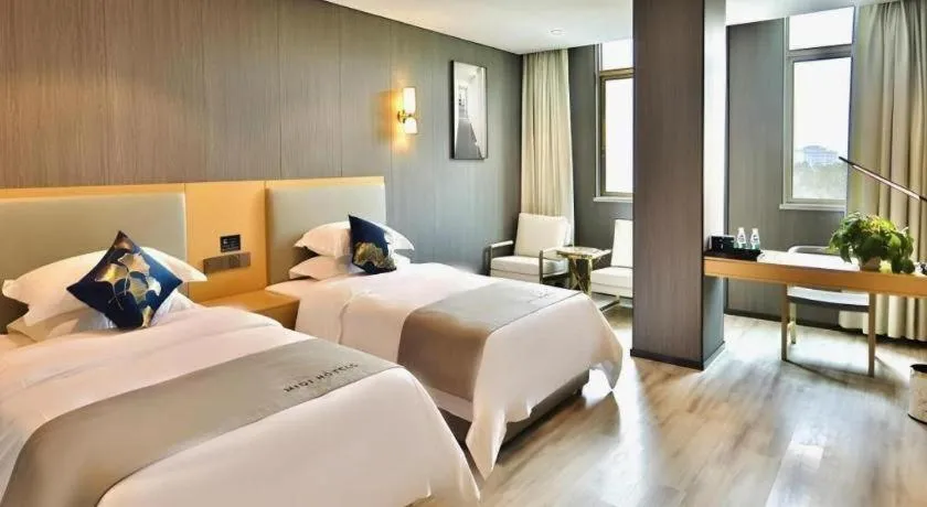 Bed in MIDI Hotel Guangdong Chaozhou Xiangqiao District Hanshan Teachers College