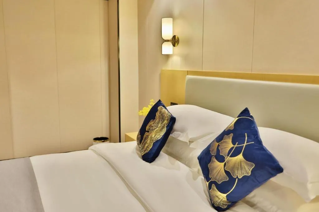 Bed in MIDI Hotel Guangdong Chaozhou Xiangqiao District Hanshan Teachers College