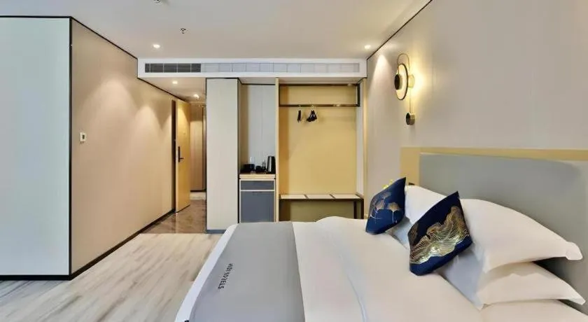 Bed in MIDI Hotel Guangdong Chaozhou Xiangqiao District Hanshan Teachers College