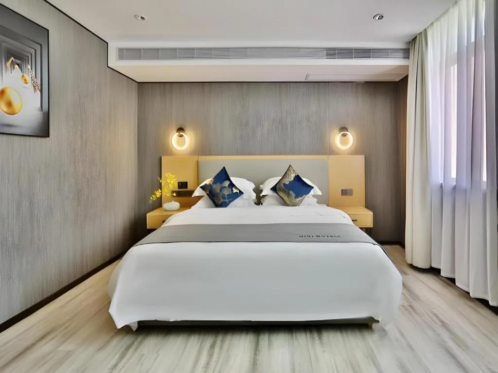 Bed in MIDI Hotel Guangdong Chaozhou Xiangqiao District Hanshan Teachers College