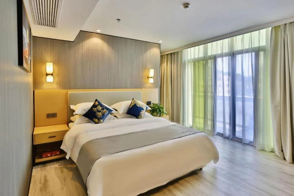Bed in MIDI Hotel Guangdong Chaozhou Xiangqiao District Hanshan Teachers College