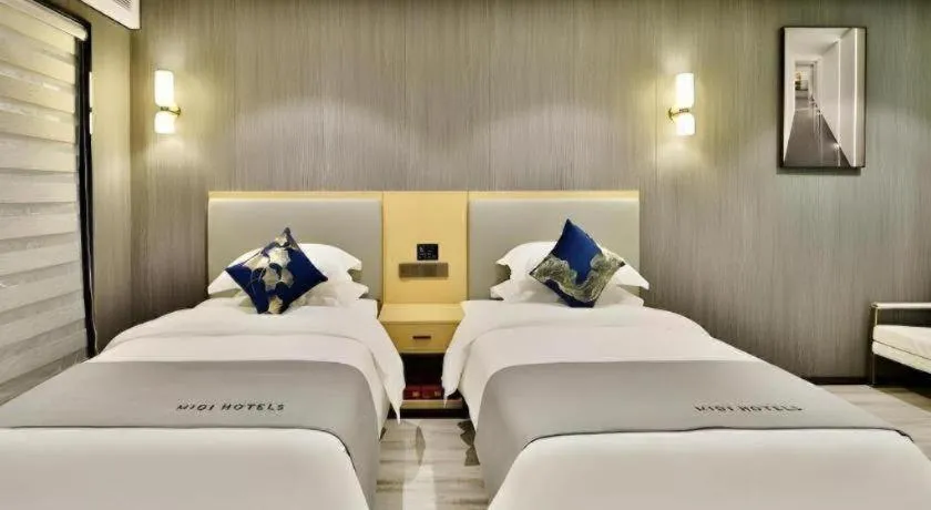 Bed in MIDI Hotel Guangdong Chaozhou Xiangqiao District Hanshan Teachers College