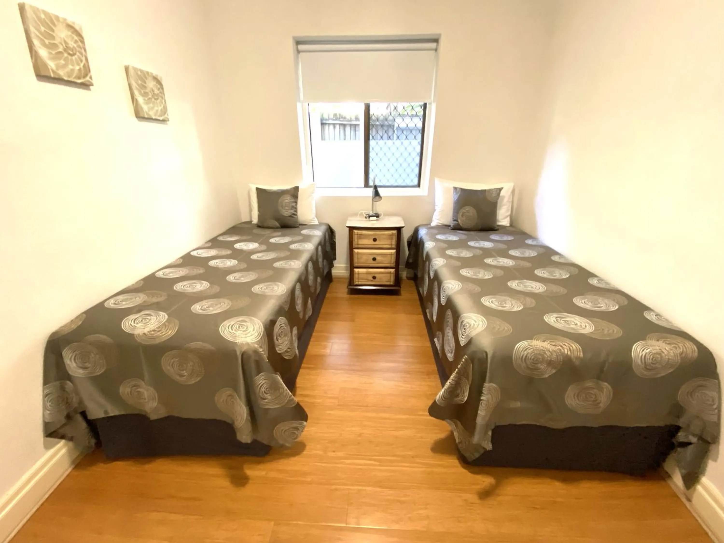 Bed in Hampton Court Apartments