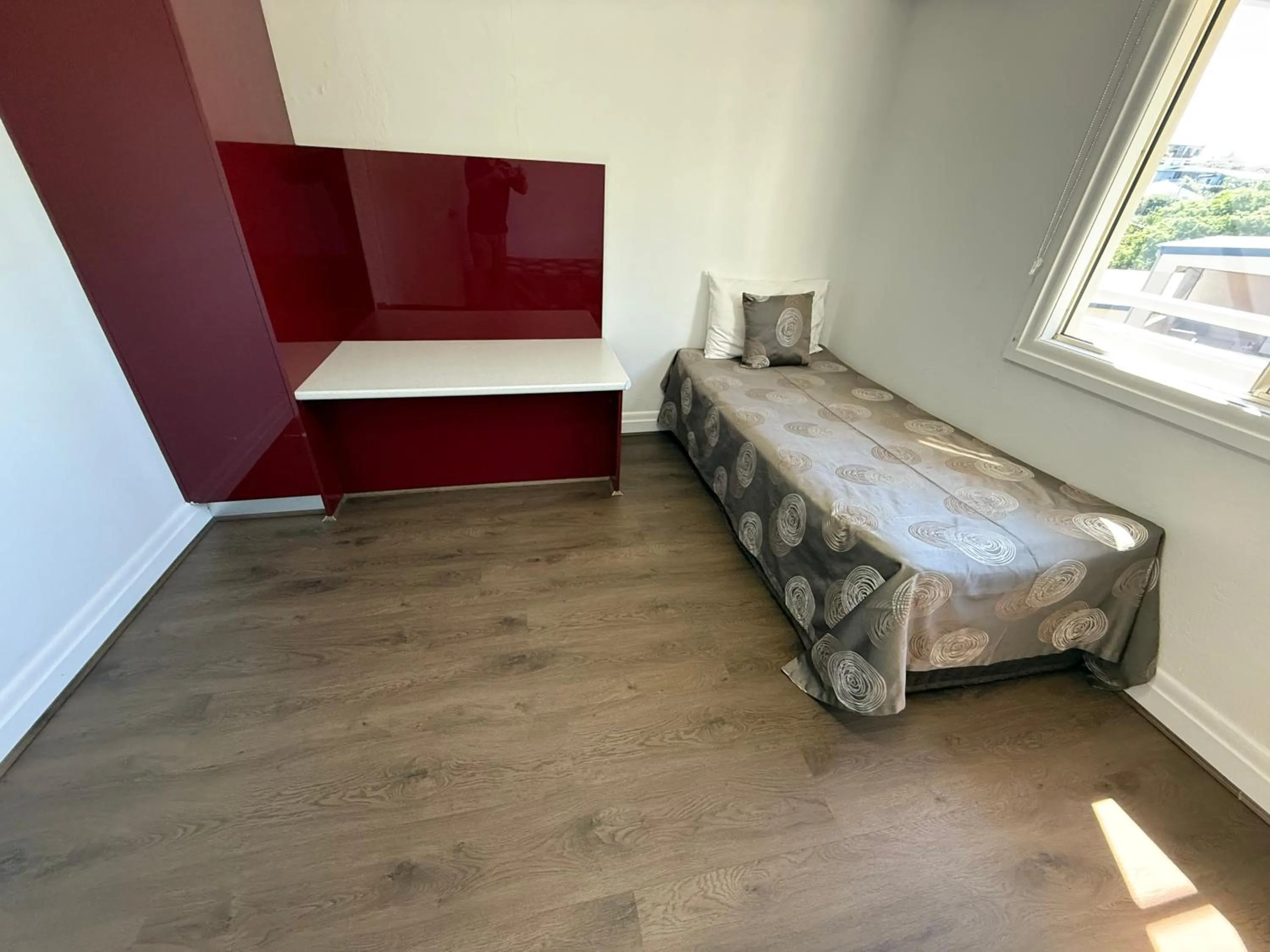 Bed in Hampton Court Apartments