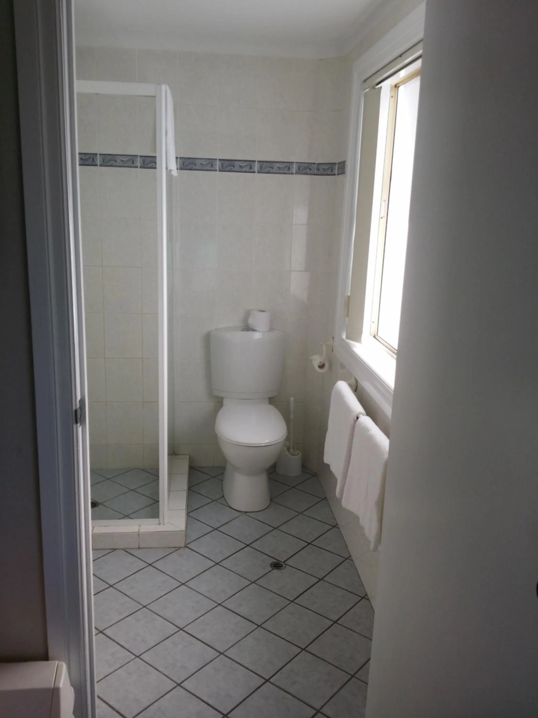 Toilet in Hampton Court Apartments