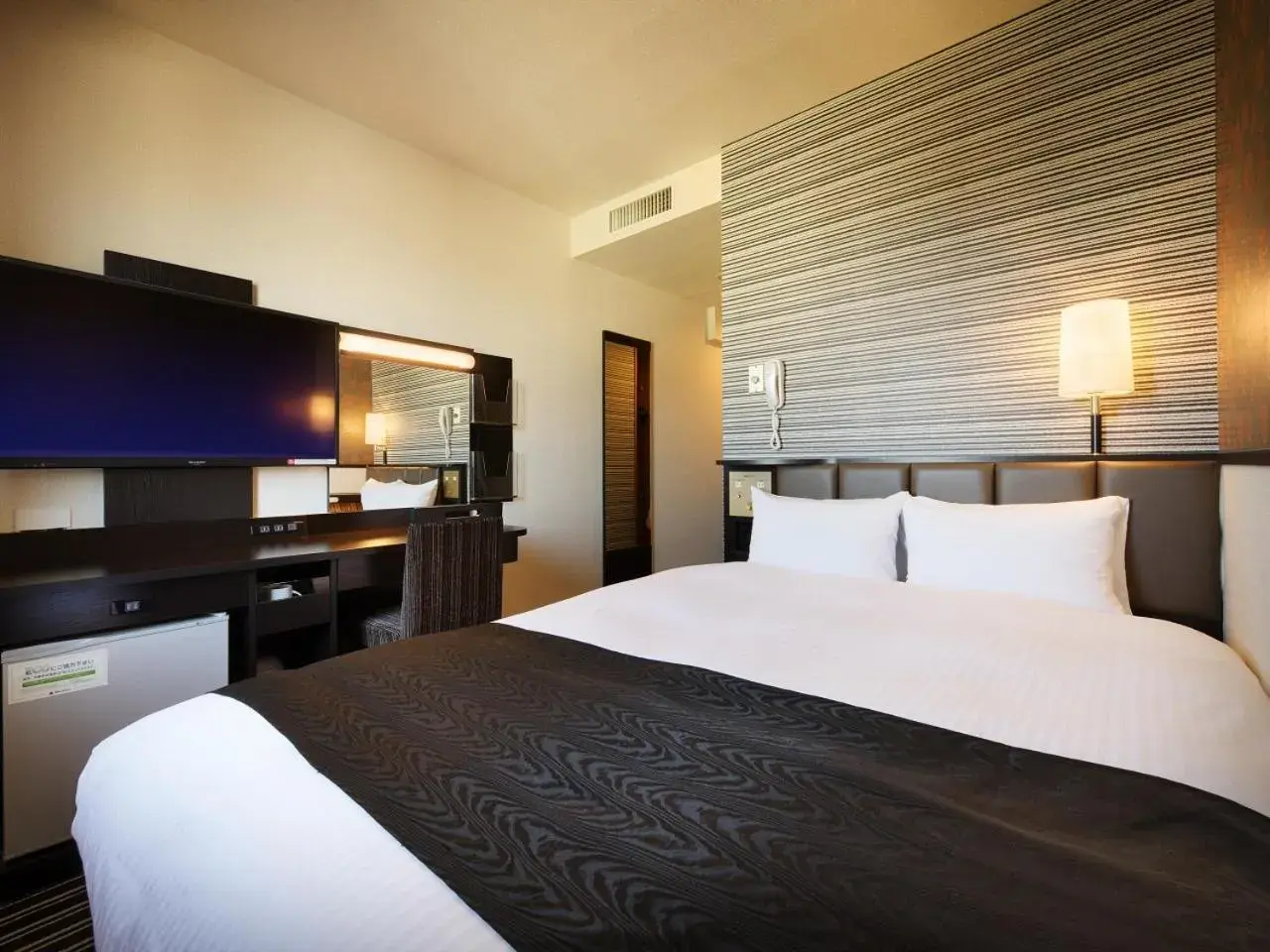 Bed in APA Hotel Isesaki-Eki Minami Bed in APA Hotel Isesaki-Eki Minami