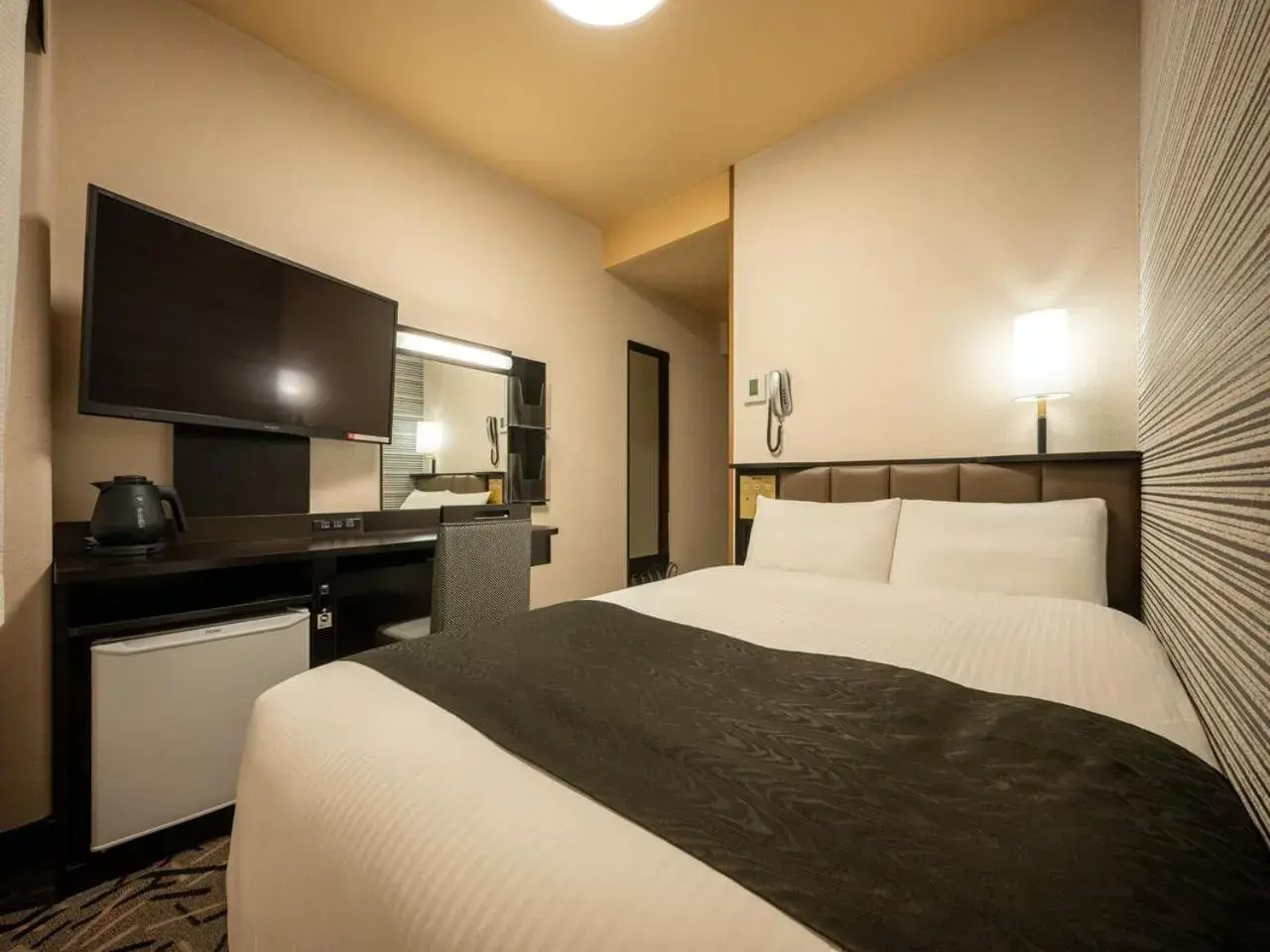 Bed in APA Hotel Isesaki-Eki Minami Bed in APA Hotel Isesaki-Eki Minami