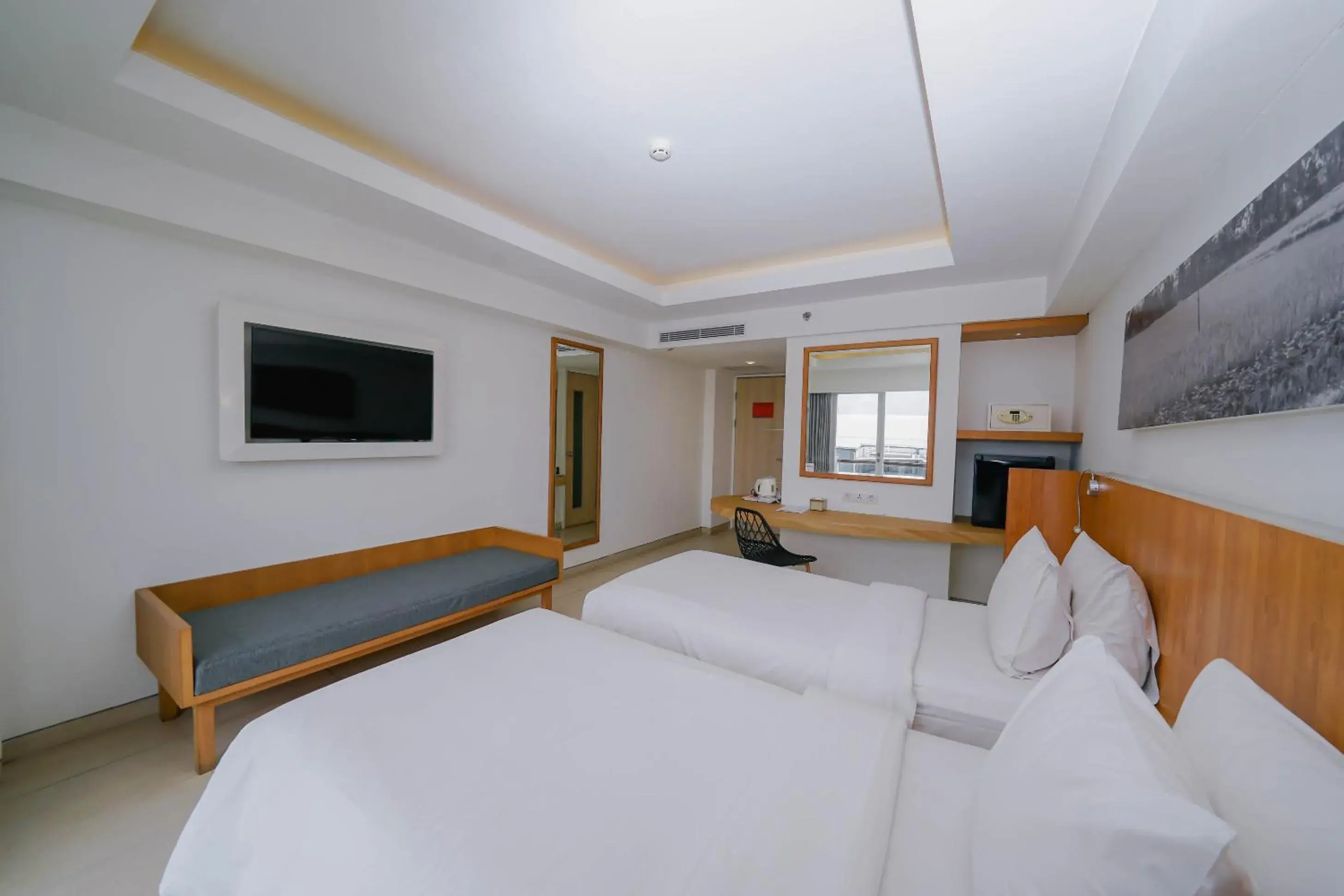 Bedroom in HARRIS Hotel Kuta Galleria Bedroom in HARRIS Hotel Kuta Galleria