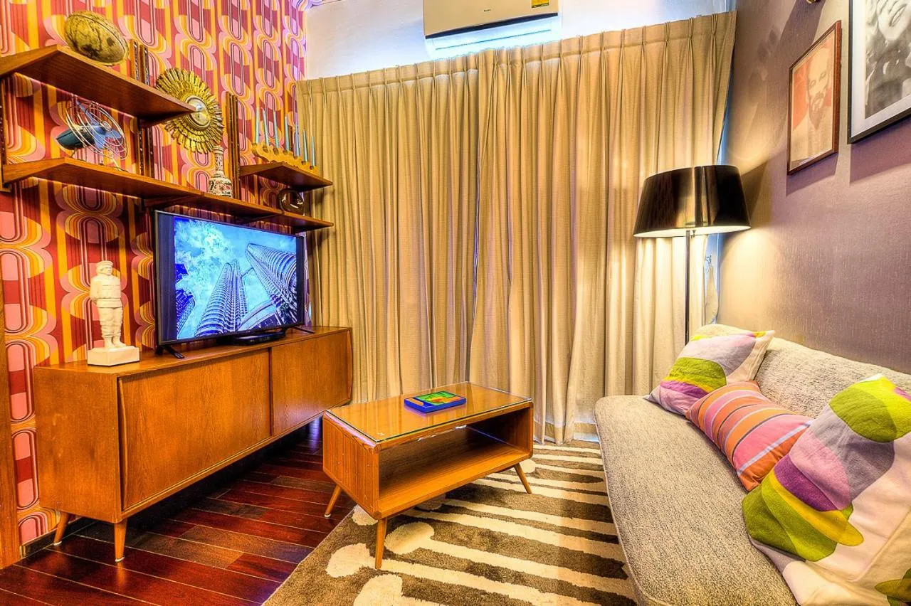Communal lounge/ TV room in The Title Boutique Phuket