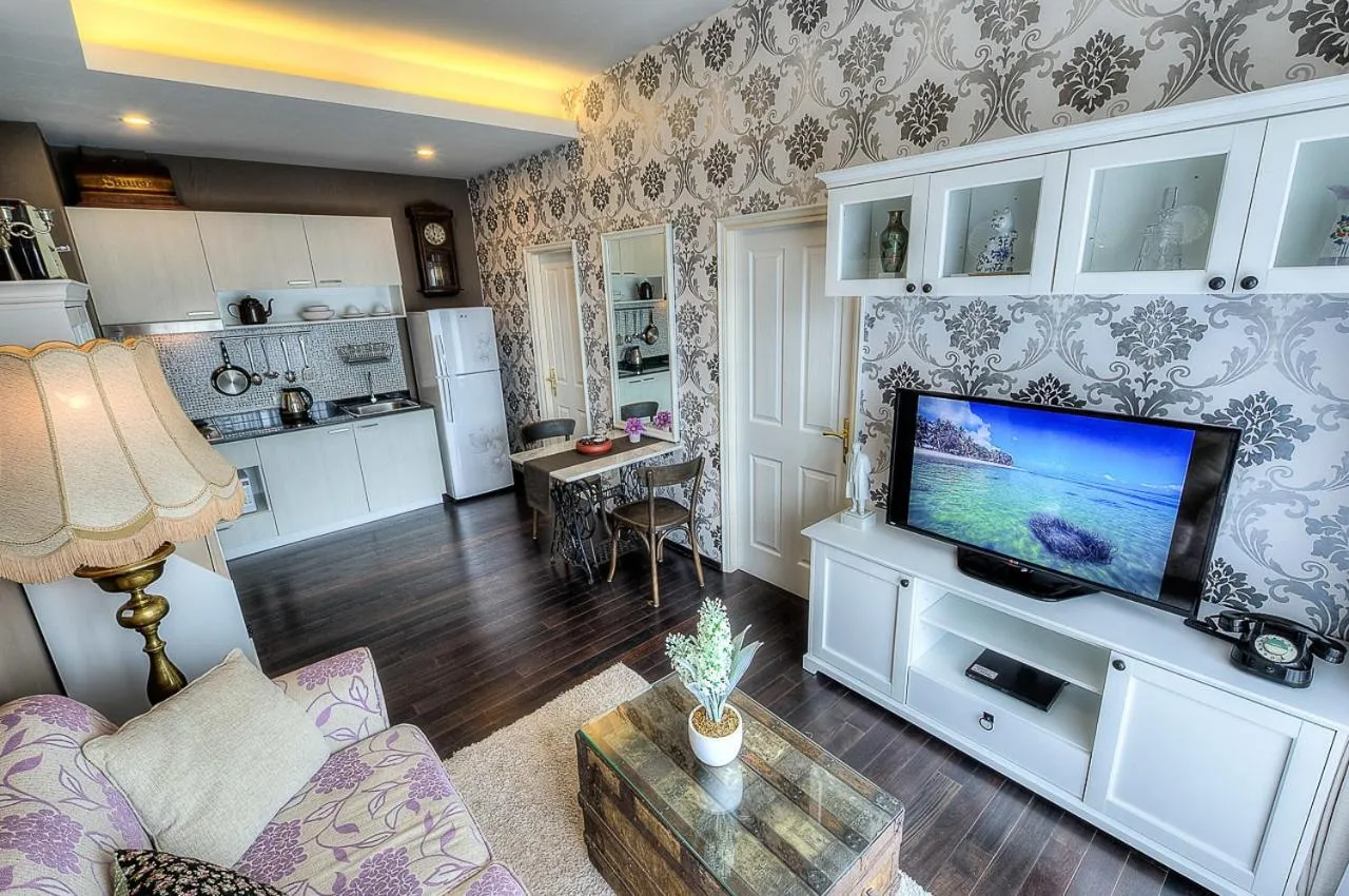 Communal lounge/ TV room in The Title Boutique Phuket