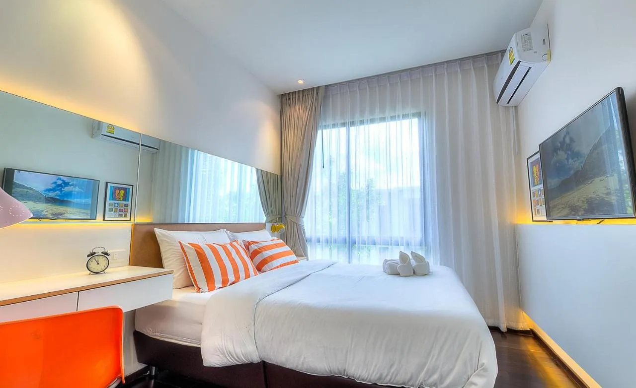 Photo of the whole room, Bed in The Title Boutique Phuket