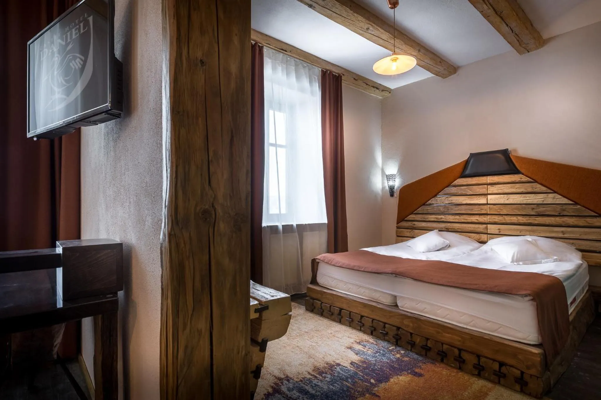 Bed in Castle Hotel Daniel