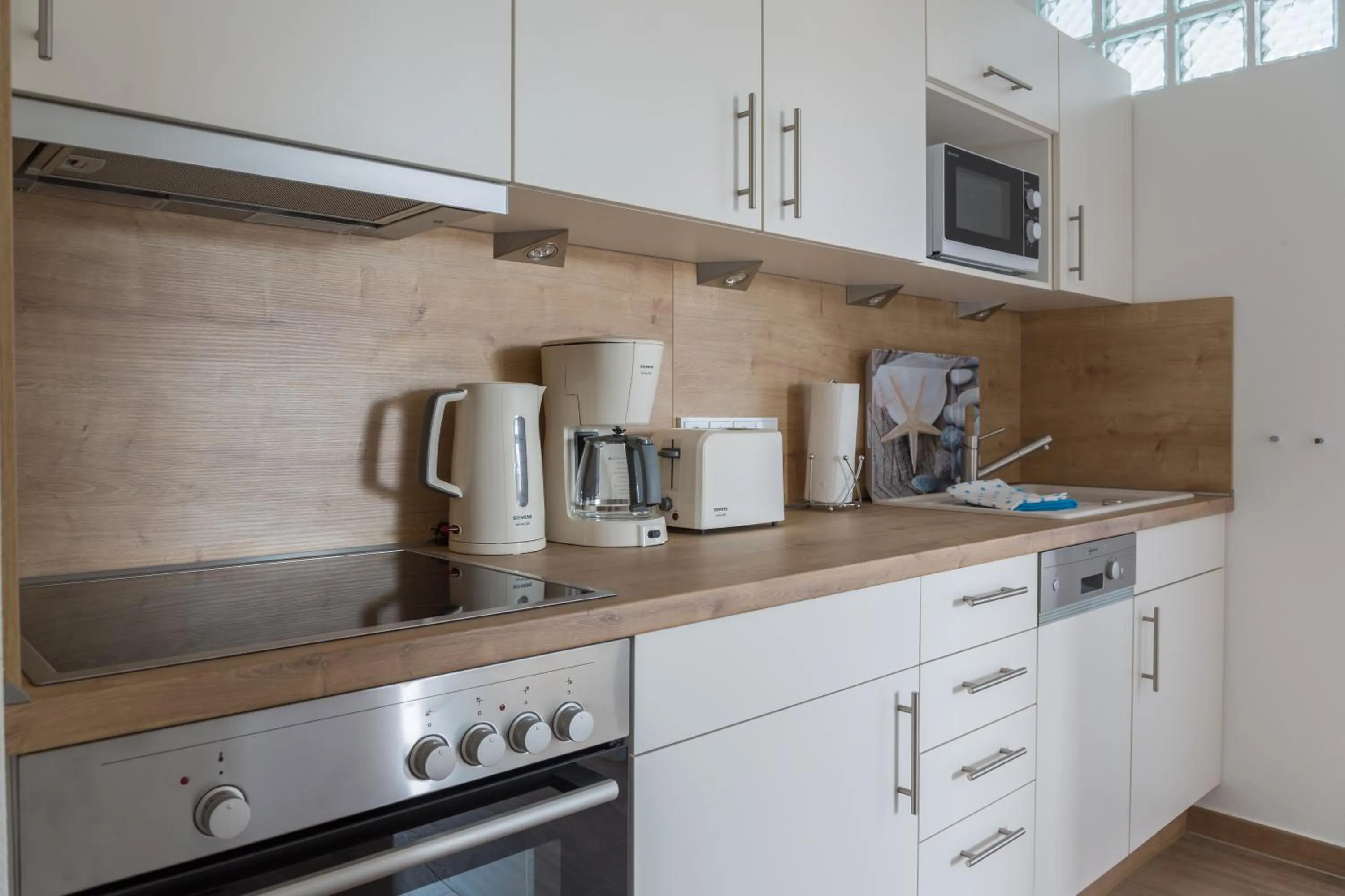 Kitchen or kitchenette in Apartments Christiansen