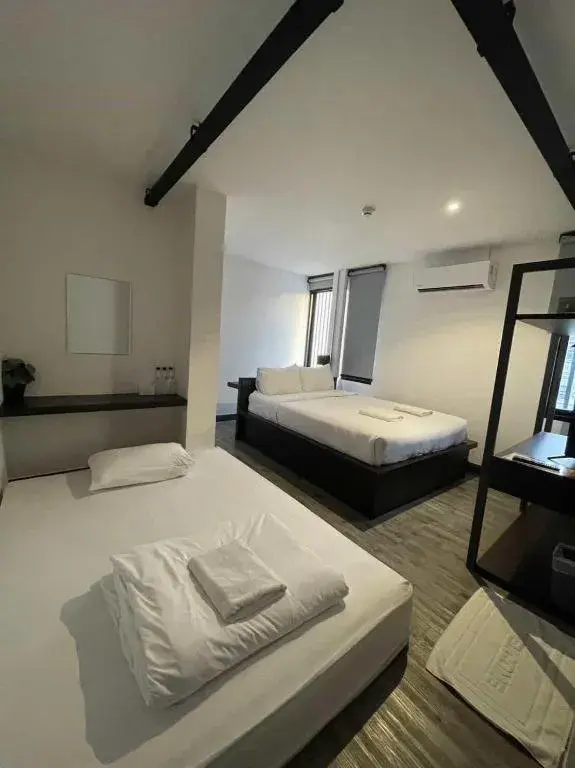 Bed in ZK Hotel Chiangmai Bed in ZK Hotel Chiangmai