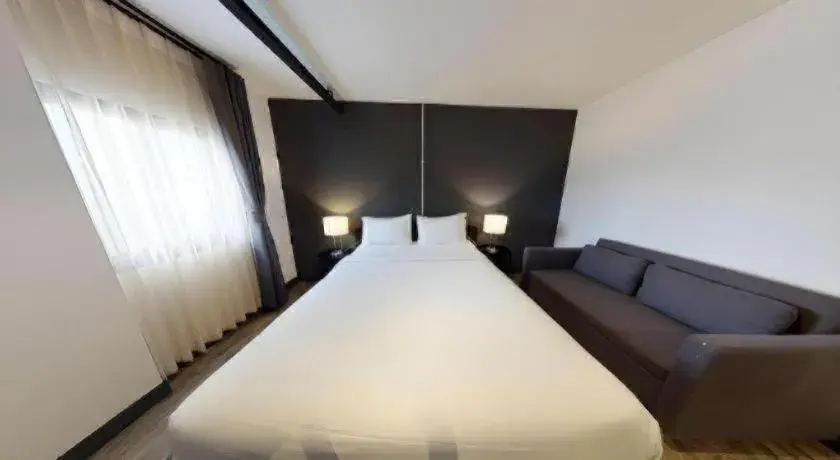 Bed in ZK Hotel Chiangmai Bed in ZK Hotel Chiangmai