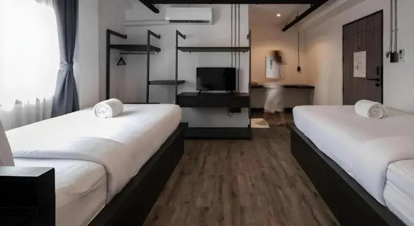 Bed in ZK Hotel Chiangmai Bed in ZK Hotel Chiangmai