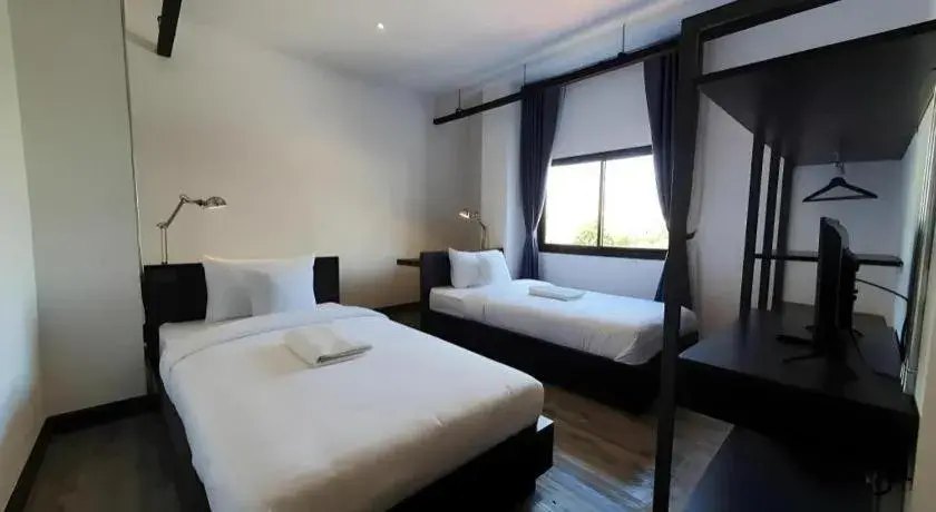 Bed in ZK Hotel Chiangmai Bed in ZK Hotel Chiangmai