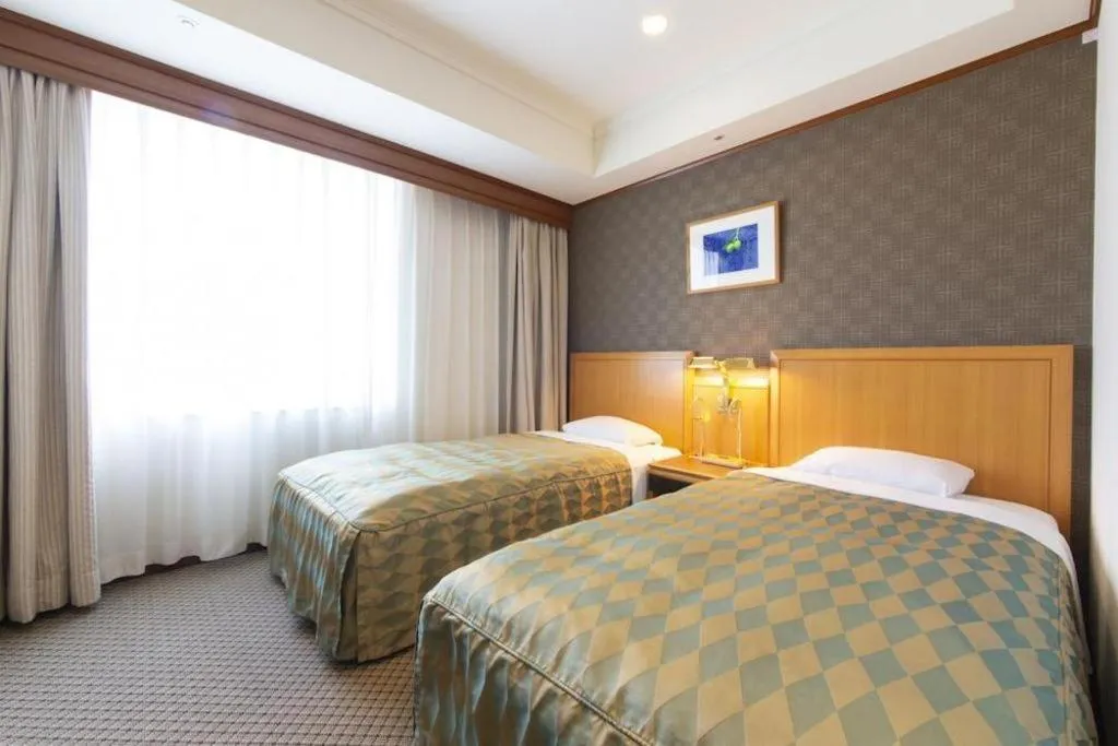 Bed in Hotel Le Port Kojimachi