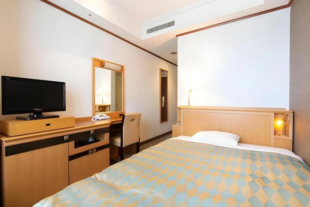 Bed in Hotel Le Port Kojimachi