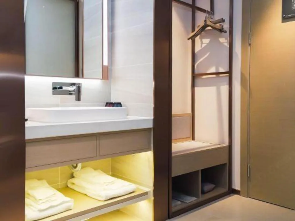 Bed in Lavande Hotel Shanghai Jing'an Shibei Gaoxin