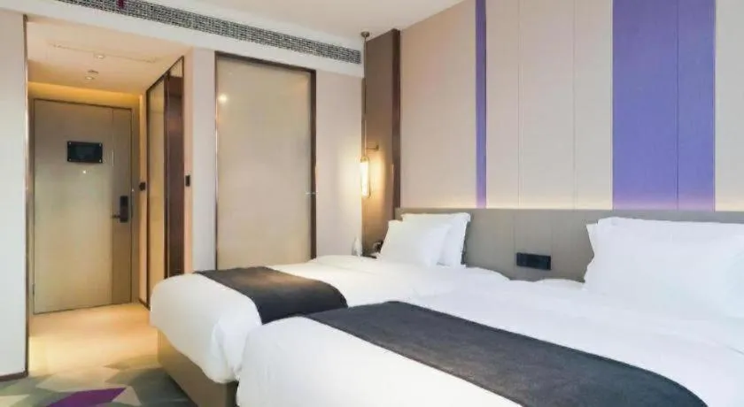 Bed in Lavande Hotel Shanghai Jing'an Shibei Gaoxin