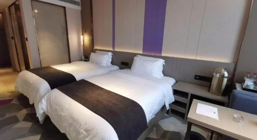 Bed in Lavande Hotel Shanghai Jing'an Shibei Gaoxin