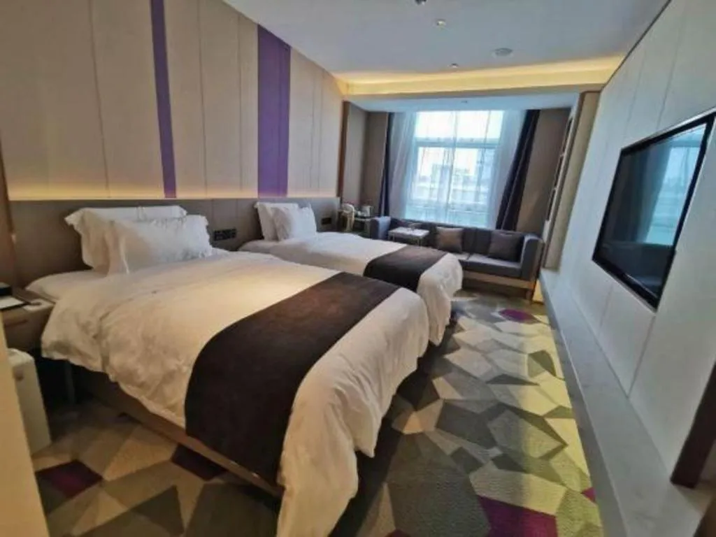 Bed in Lavande Hotel Shanghai Jing'an Shibei Gaoxin