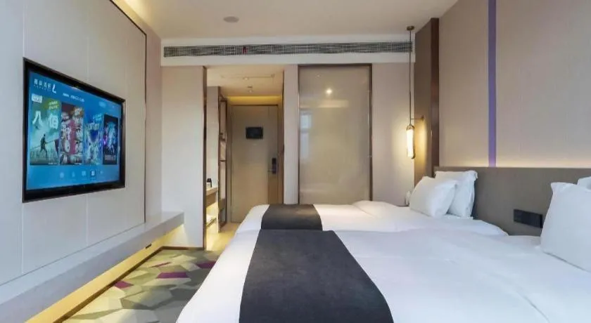 Bed in Lavande Hotel Shanghai Jing'an Shibei Gaoxin