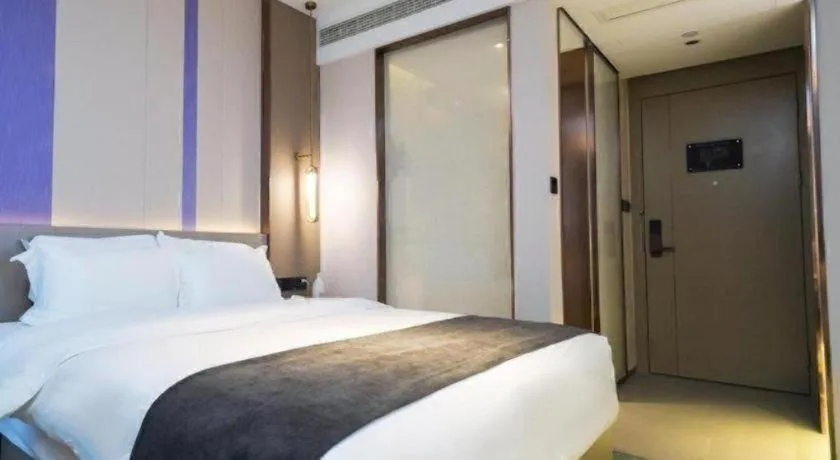 Bed in Lavande Hotel Shanghai Jing'an Shibei Gaoxin