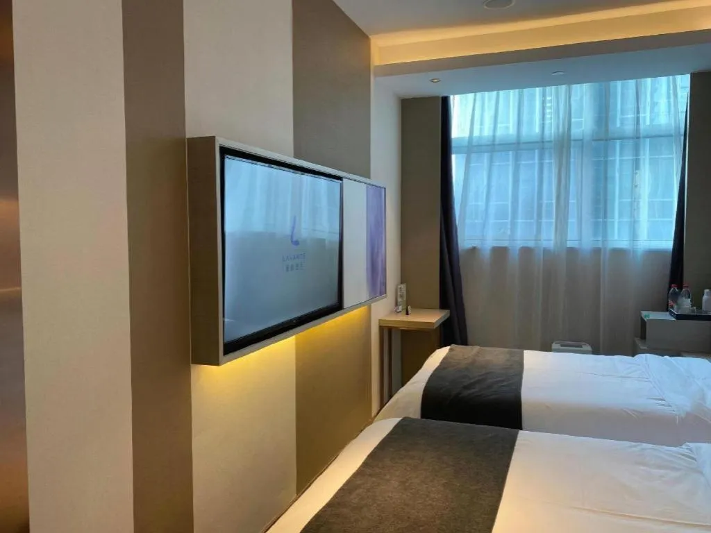Bed in Lavande Hotel Shanghai Jing'an Shibei Gaoxin