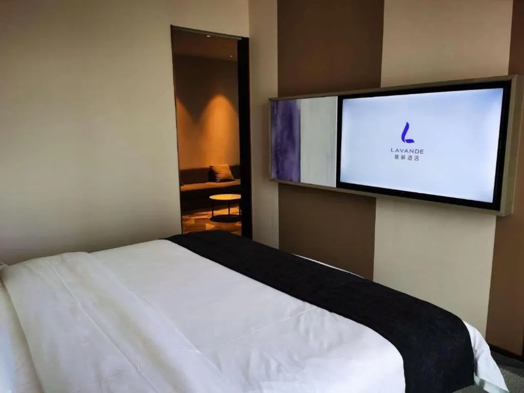 Bed in Lavande Hotel Shanghai Jing'an Shibei Gaoxin