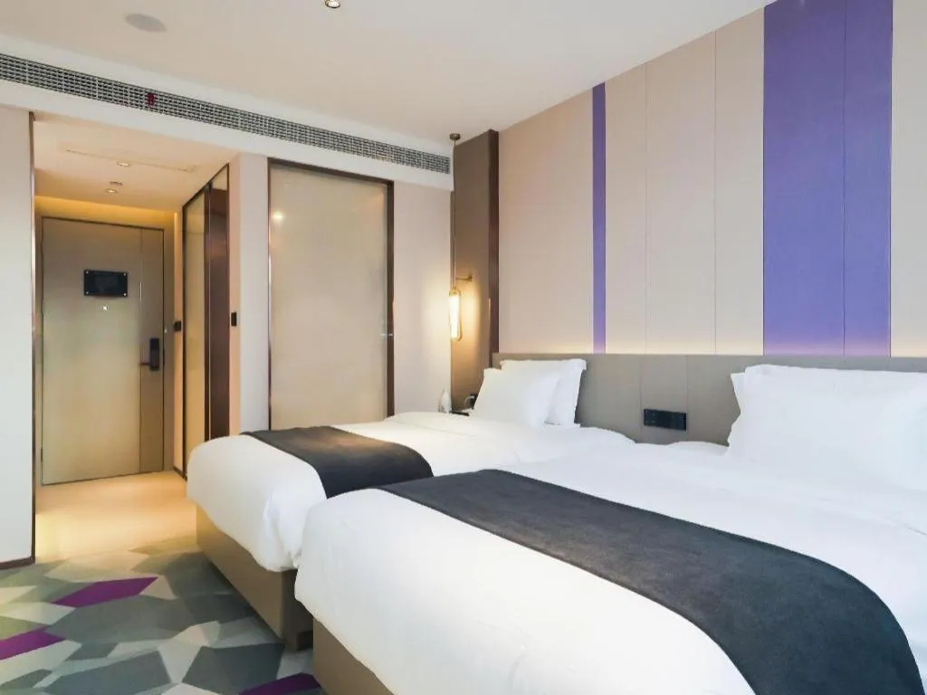 Bed in Lavande Hotel Shanghai Jing'an Shibei Gaoxin