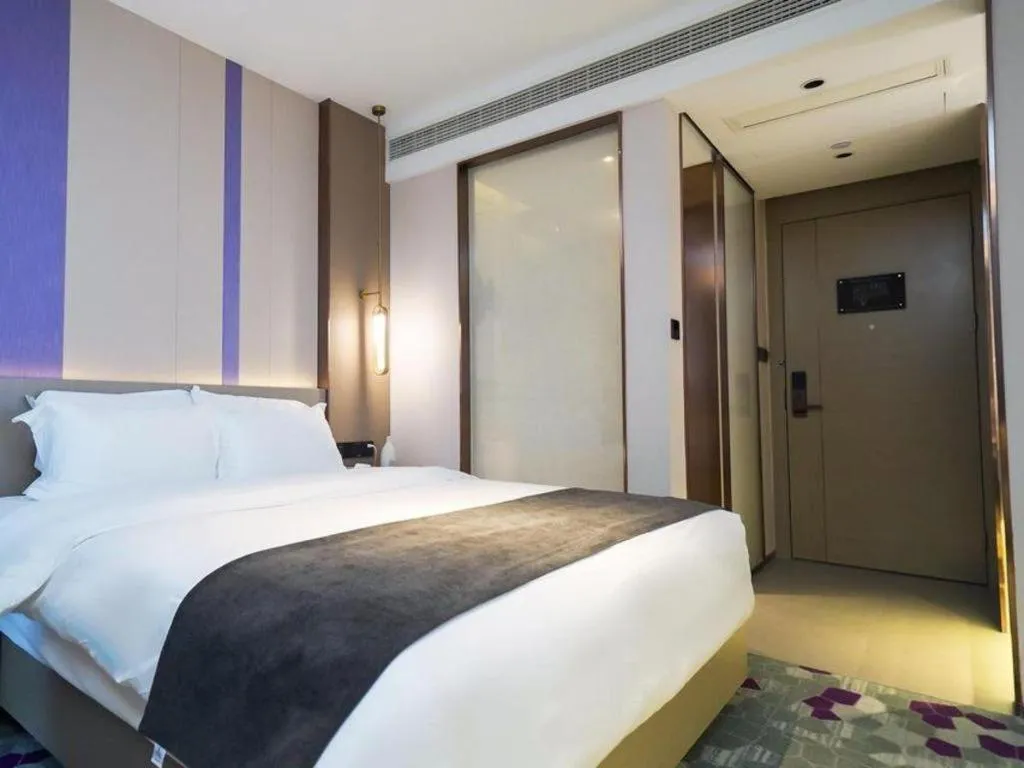 Bed in Lavande Hotel Shanghai Jing'an Shibei Gaoxin