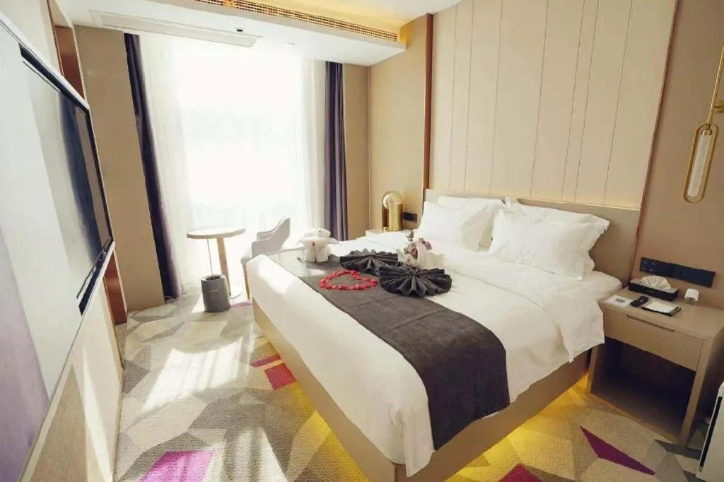 Bed in Lavande Hotel Shanghai Jing'an Shibei Gaoxin