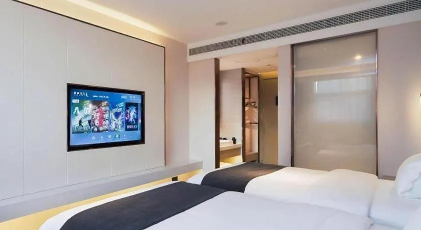 Bed in Lavande Hotel Shanghai Jing'an Shibei Gaoxin