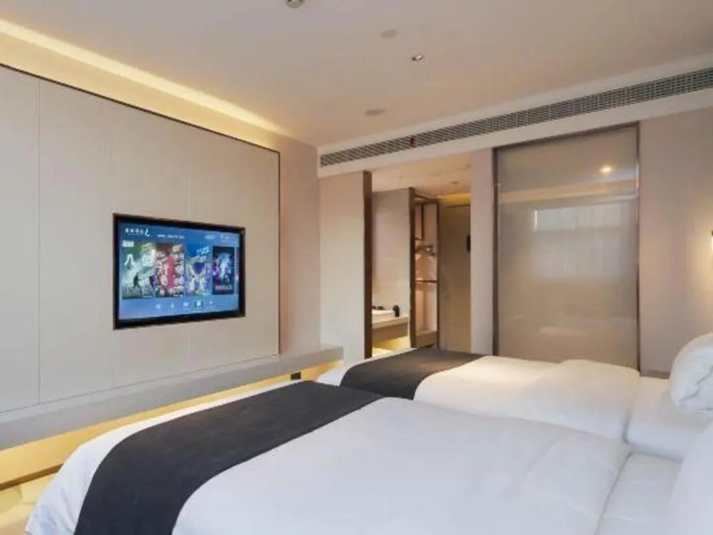 Bed in Lavande Hotel Shanghai Jing'an Shibei Gaoxin