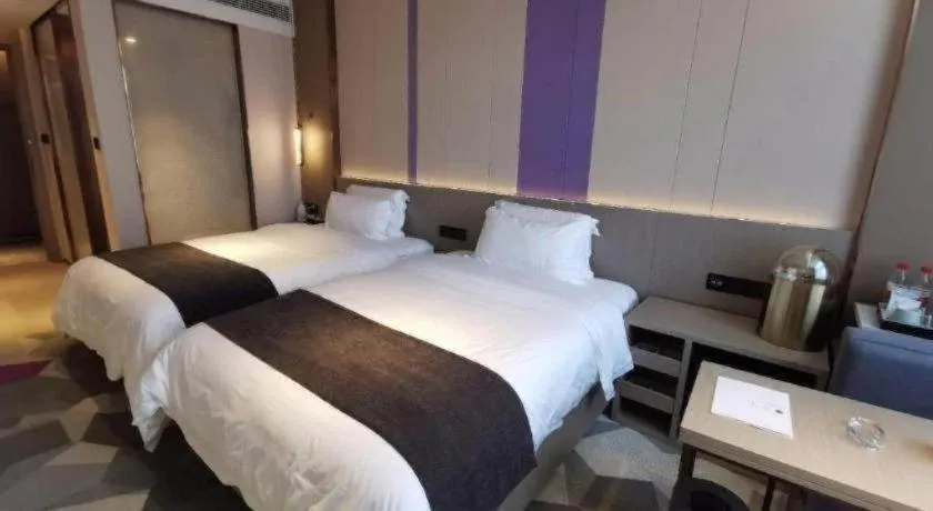 Bed in Lavande Hotel Shanghai Jing'an Shibei Gaoxin