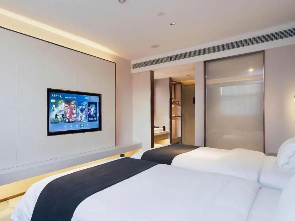 Bed in Lavande Hotel Shanghai Jing'an Shibei Gaoxin