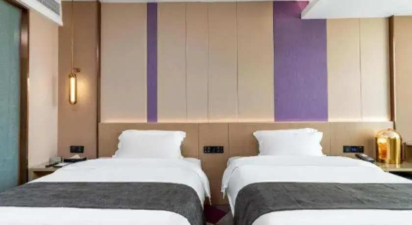 Bed in Lavande Hotel Chaozhou Fortune Center Lin Street Bed in Lavande Hotel Chaozhou Fortune Center Lin Street