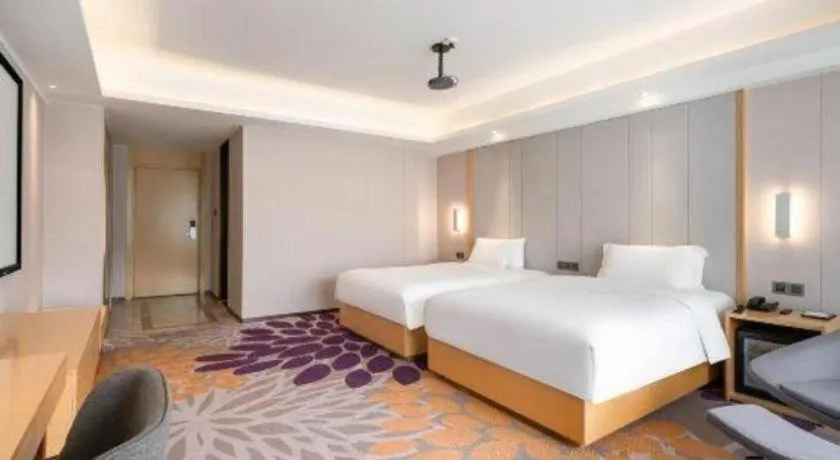 Bed in Lavande Hotel Maoming High-speed Railway Station Xinfu Road