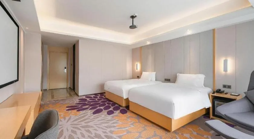 Bed in Lavande Hotel Maoming High-speed Railway Station Xinfu Road