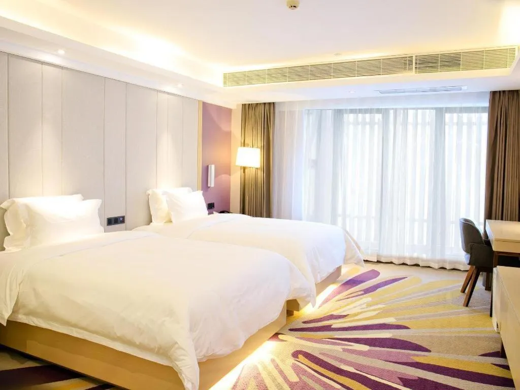 Bed in Lavande Hotel Maoming High-speed Railway Station Xinfu Road