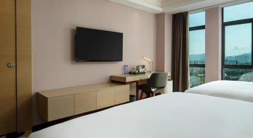 Bed in Lavande Hotel Shanwei Haifeng Fenghuang New City Tianhong Plaza