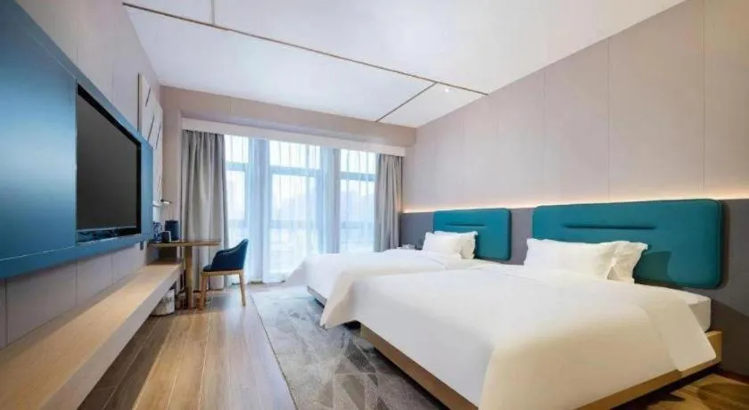 Bed in Lavande Hotel Shanwei Haifeng Fenghuang New City Tianhong Plaza