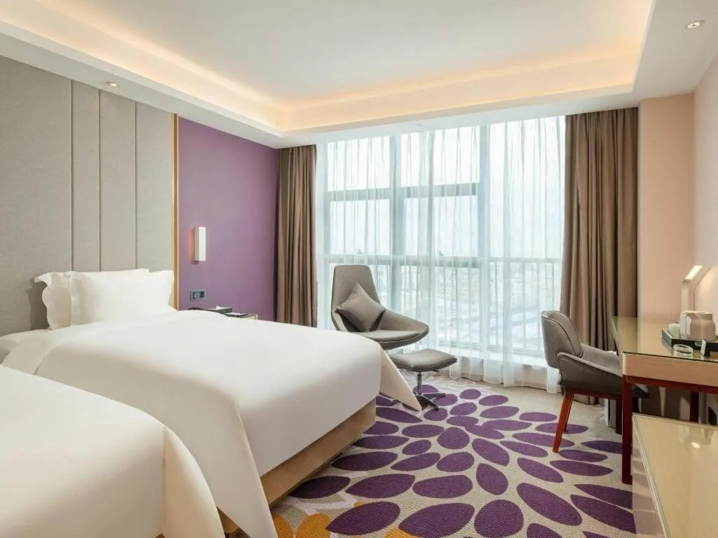 Bed in Lavande Hotel Zhongshan Xiaolan Taifeng