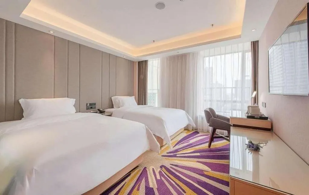 Bed in Lavande Hotel Zhongshan Xiaolan Taifeng