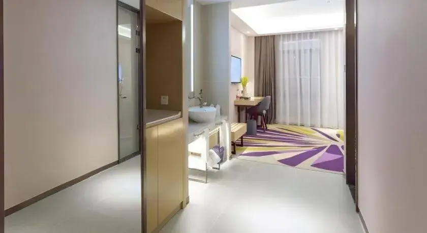 Bed in Lavande Hotel Huizhou Shiwan Bed in Lavande Hotel Huizhou Shiwan