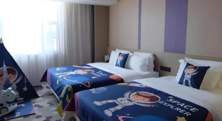 Bed in Lavande Hotel Zhongshan Shiqi Daxinxinduhui North Zhongshan Station